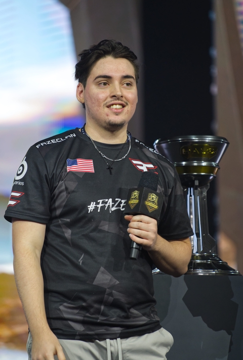 Renegade next to the Halo World Championship trophy.