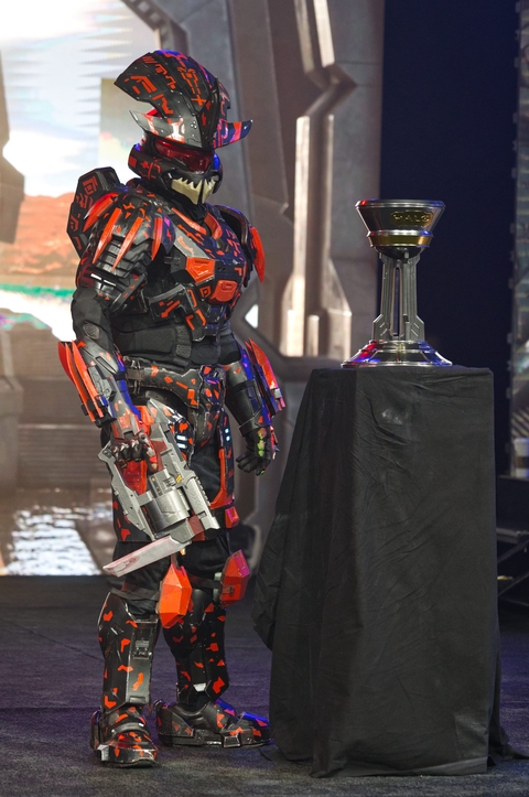 Banished Spartan next to the Halo World Championship trophy.