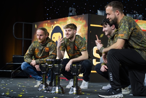 SSG posing with their trophies on the main stage.